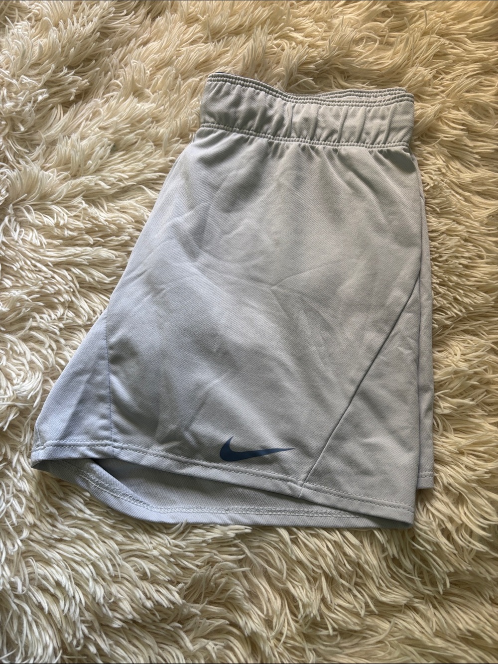Nike Light Gray Athletic Skort with Blue Swoosh Accent
